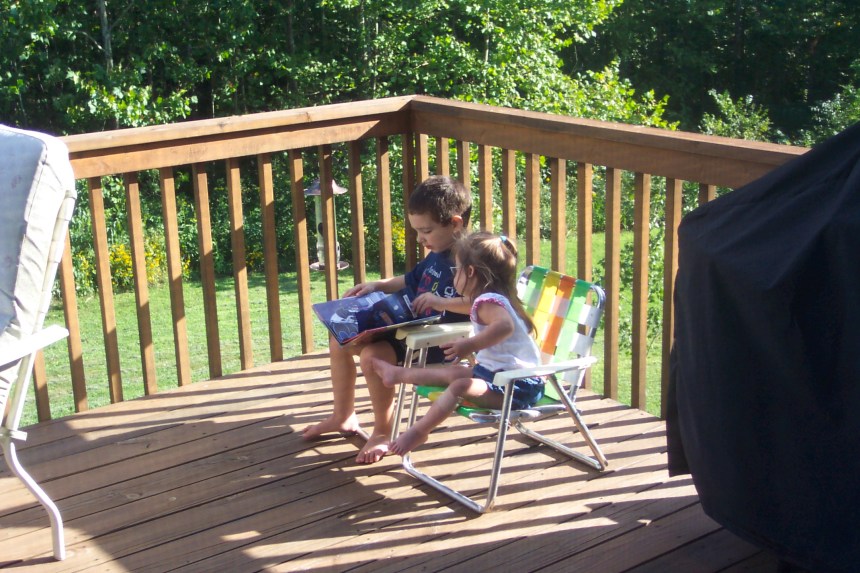 Alex can read Batman almost word for word...and Julianna LIKES it!