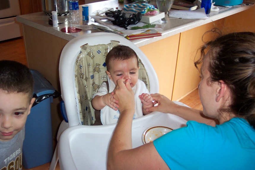 100_5032 First bite: Nicholas's first meal, 9/12/09
