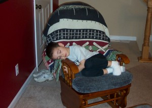 Alex sleeping in chair