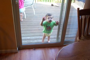 Nicholas mouth on window