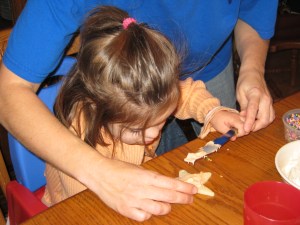 Helping Julianna decorate cookies