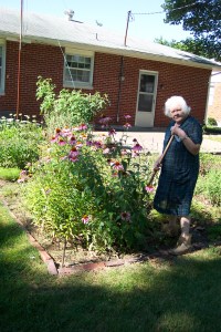 Grandma, in her garden in 2003. To say this woman had a green thumb in her prime is a gross understatement.