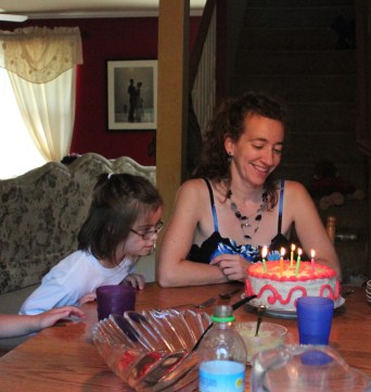 You can tell how serious this girl is about her birthday cakes. Even when they're not for her birthday, but Mommy's.