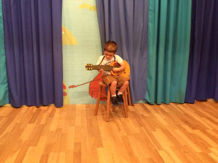 He's really into guitar lately. Air guitar, mostly. My goal is to have a family band....maybe this is Michael's instrument?