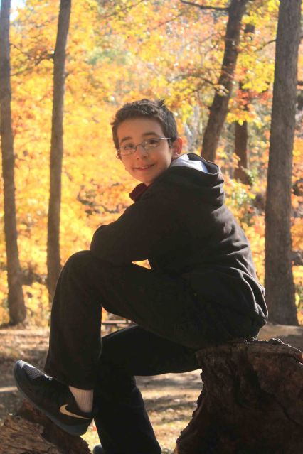 But in the end, wouldn't you know it? One of the test shots won, and for the second year straight Alex will grace our wall not in a nice bright sweater, but the same hoodie he wears every single day. How tween of him. ;)